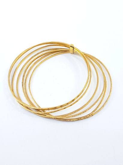 WEEKLY TIE-DOWN in yellow gold 750°. 
weight...