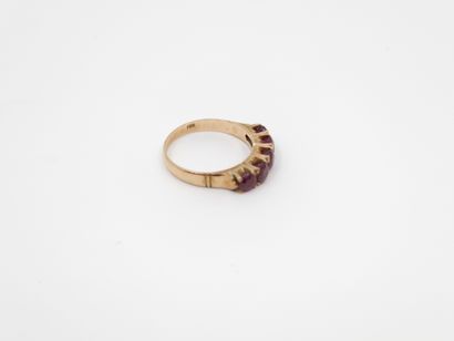 BAGUE jarretière en or 14 kt ornée de pierres...