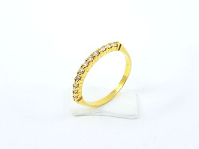 HALF-ALLIANCE in yellow gold 750° decorated...