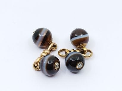Pair of 14kt yellow gold agate cufflinks...