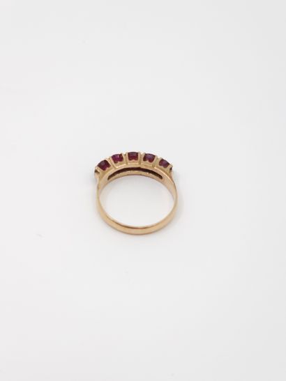 BAGUE jarretière en or 14 kt ornée de pierres...