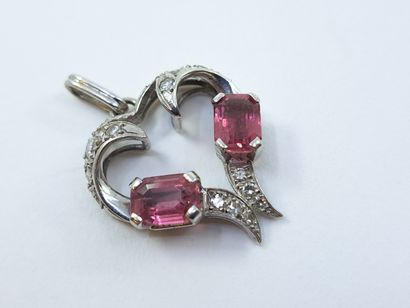 White gold pendant set with diamonds and...