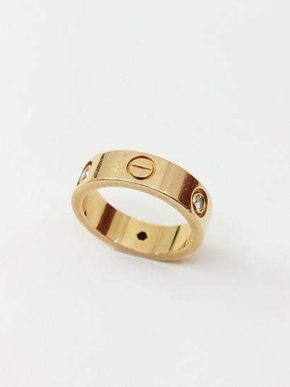 CARTIER LOVE
Bague en or rose 750° et trois...