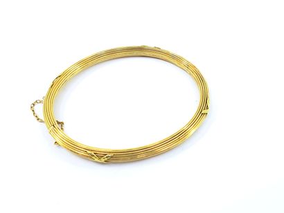 FRENCH WORK
Bracelet in yellow gold 750°...