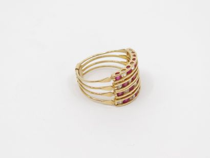 Yellow gold ring 750° four rows decorated...