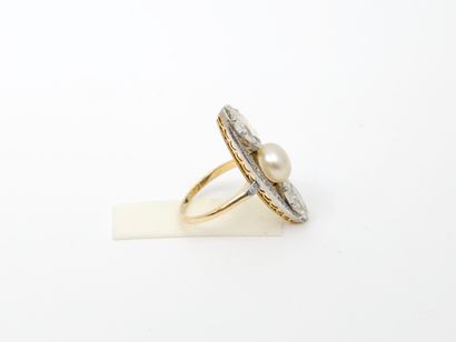 RING in two-tone 750° gold, set with a pearl,...