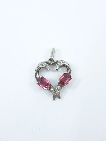 White gold pendant set with diamonds and...