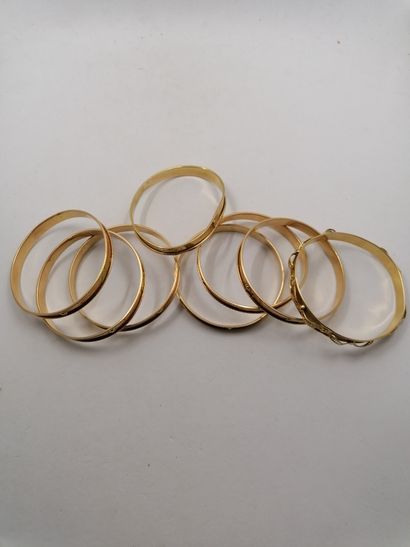 8 rigid bracelets 18kt gold 75,86 g including...