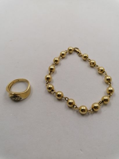 1 Ring Gold 18kt and stones 5,62g 1 Bracelet...