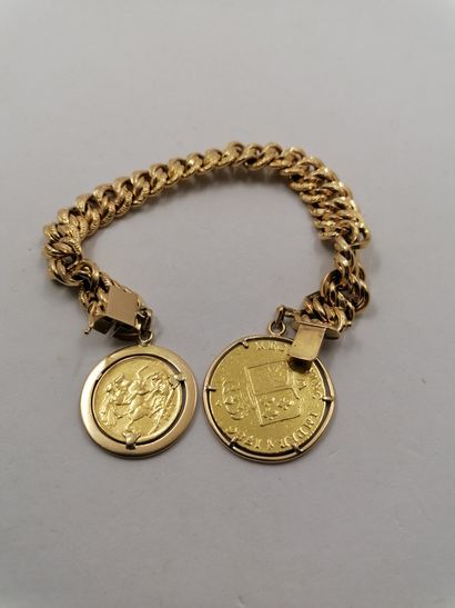 1 Gold Bracelet 18kt and 2 charms 60,82 g...