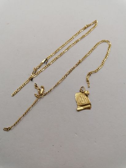 1 Pendant Gold 18 carats 0,84 g deter 1 Chain...
