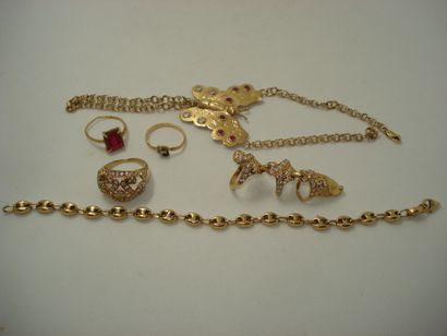 4 Rings Gold 18kt and stones 21,54 g 1 Bracelet...