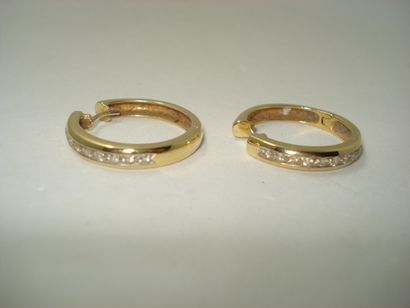 1 Pair of earrings 18kt yellow gold and diamonds...