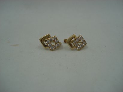1 Pair of 18kt gold earrings and stones 1,57g...