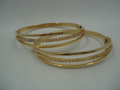 2 Bracelets rigides ouvrants Or jaune 18kt...