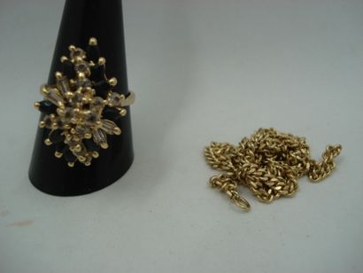 1 Ring Gold 18kt and stones 9,18g 1 Chain...