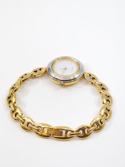 GUCCI 
MONTRE VINTAGE à six lunettes interchangeable
Montre...