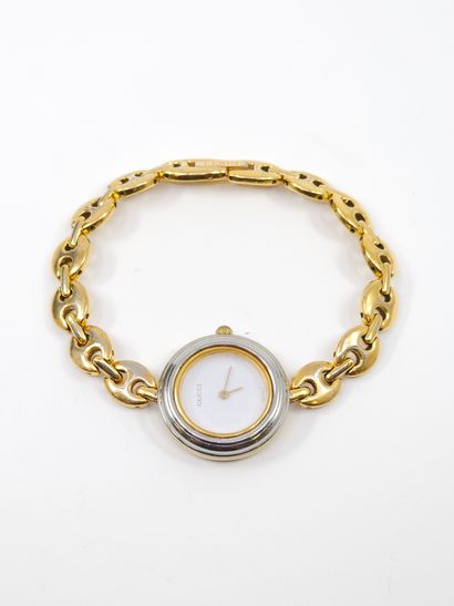 GUCCI 
MONTRE VINTAGE à six lunettes interchangeable
Montre...