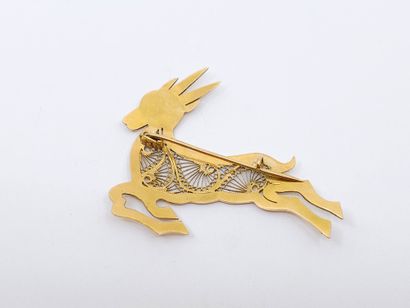 TRAVAIL ETRANGER
BROCHE en or jaune représentant...