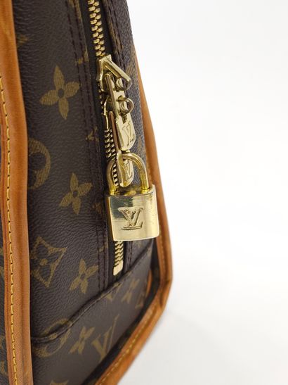 LOUIS VUITTON modèle Rivoli en toile mon...