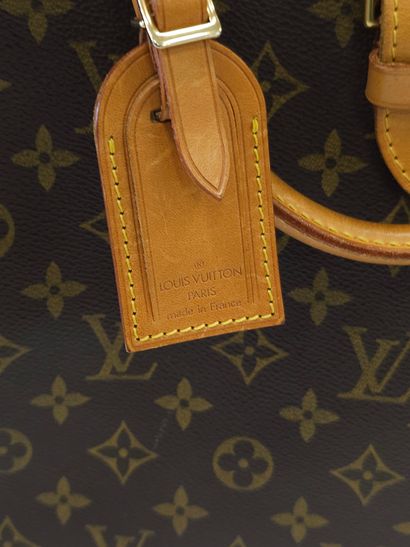 LOUIS VUITTON modèle Rivoli en toile mon...