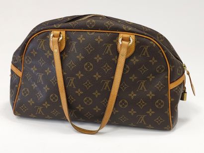 LOUIS VUITTON
Modèle Montorgueil 
Sac à main...