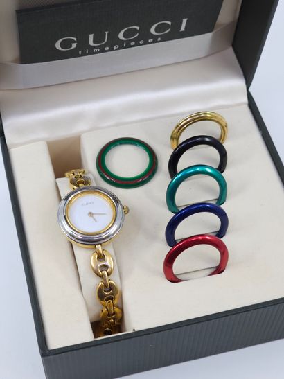GUCCI 
MONTRE VINTAGE à six lunettes interchangeable
Montre...