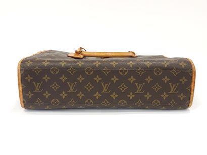 LOUIS VUITTON modèle Rivoli en toile mon...