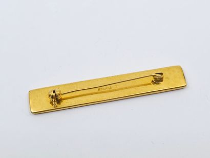 HERMES
BROCHE en métal doré émaillée, à décor...