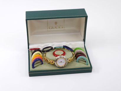 GUCCI 
MONTRE VINTAGE à quinze lunettes interchangeable...
