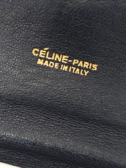 CELINE Paris
Pochette en cuir bleu et blanc,...