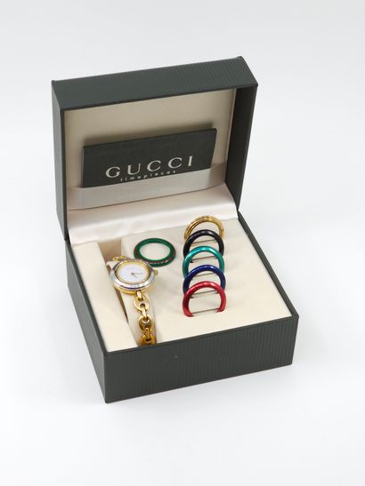 GUCCI 
MONTRE VINTAGE à six lunettes interchangeable
Montre...