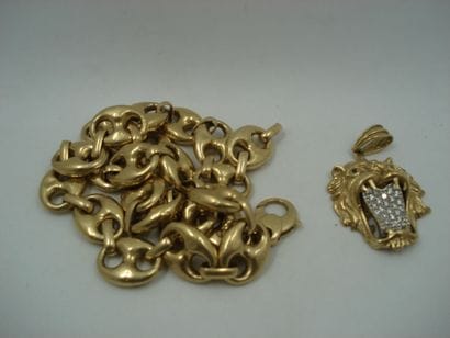 1 Pendentif Or 18kt et pierres 33,12g 1 Chaine...