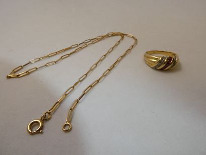1 Ring 18kt Gold and stones 4,43g 1 Chain...