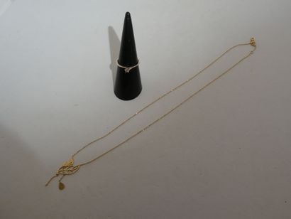1 Bague Or gris 18kt et diamant 1,65g 1 Collier...