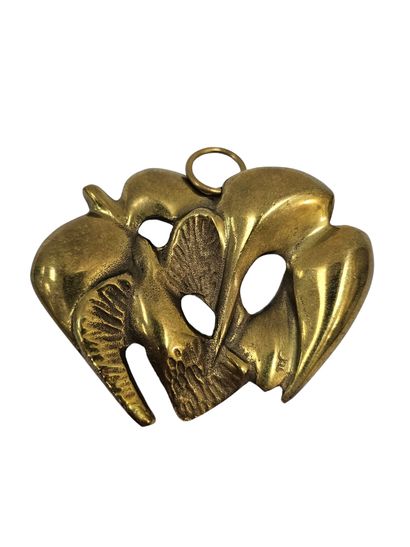 RENE COUTELLE 
Broche en bronze représentant...