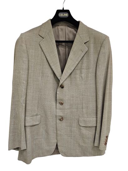 HERMES
Veste grise à carreaux
Taille 54
T-shirt...