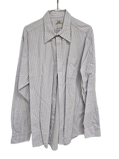 HERMES
Chemise noire à motif floral
Chemise...