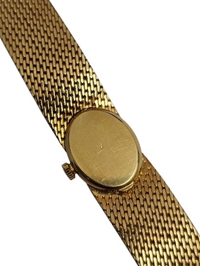 MONTRE BRACELET de dame en or jaune 750°,...