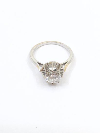 BAGUE solitaire en or gris 750 ornée d'un...