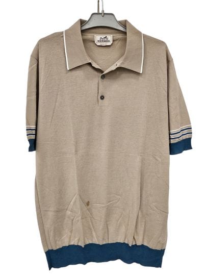 Versace
Polo bleu marine
Hermes
Pull en cachemire...