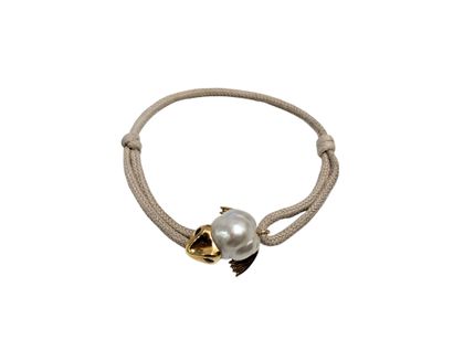 BRACELET cordon orné d'un motif 