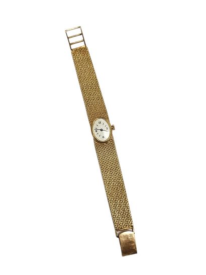 MONTRE BRACELET de dame en or jaune 750°,...