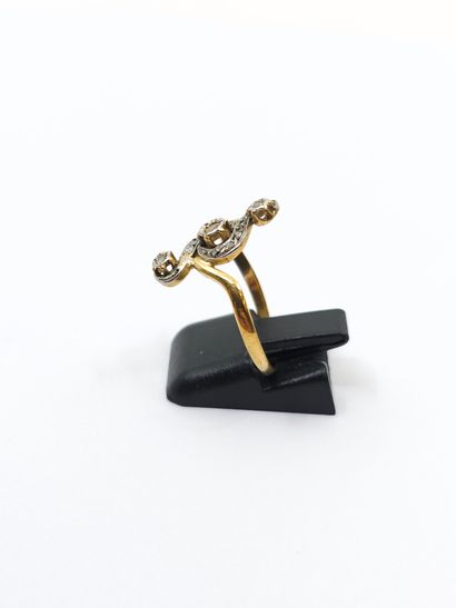 BAGUE TOURBILLON en or deux tons ornée de...