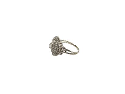 Gold and platinum daisy ring set with diamonds...