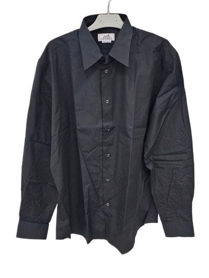 Versace
Polo bleu marine
Hermes
Pull en cachemire...