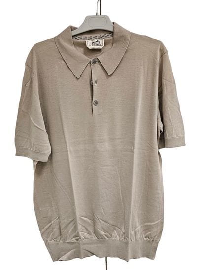 HERMES
Polo beige
Taille XL
Polo bleu
Taille...