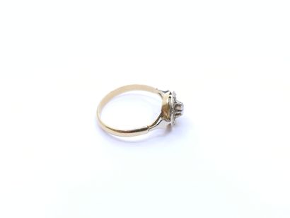 RING in two-tone 750° gold set with a diamond
Gross...