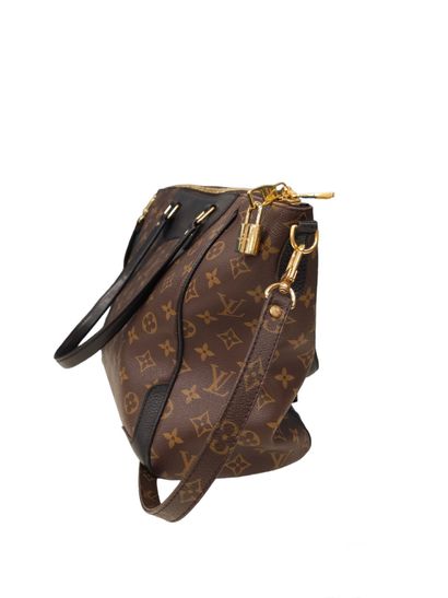 LOUIS VUITTON Estrela
Brown and black leather...