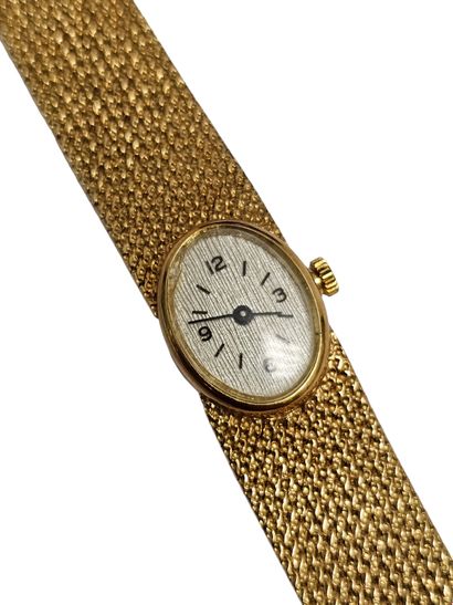MONTRE BRACELET de dame en or jaune 750°,...